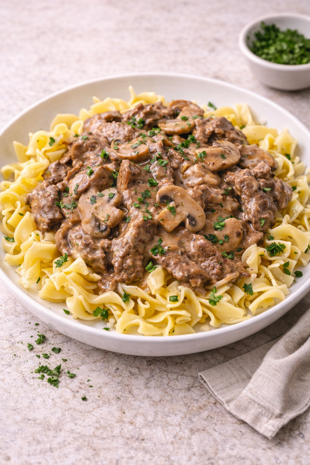 Beef stroganoff with buttered noodles